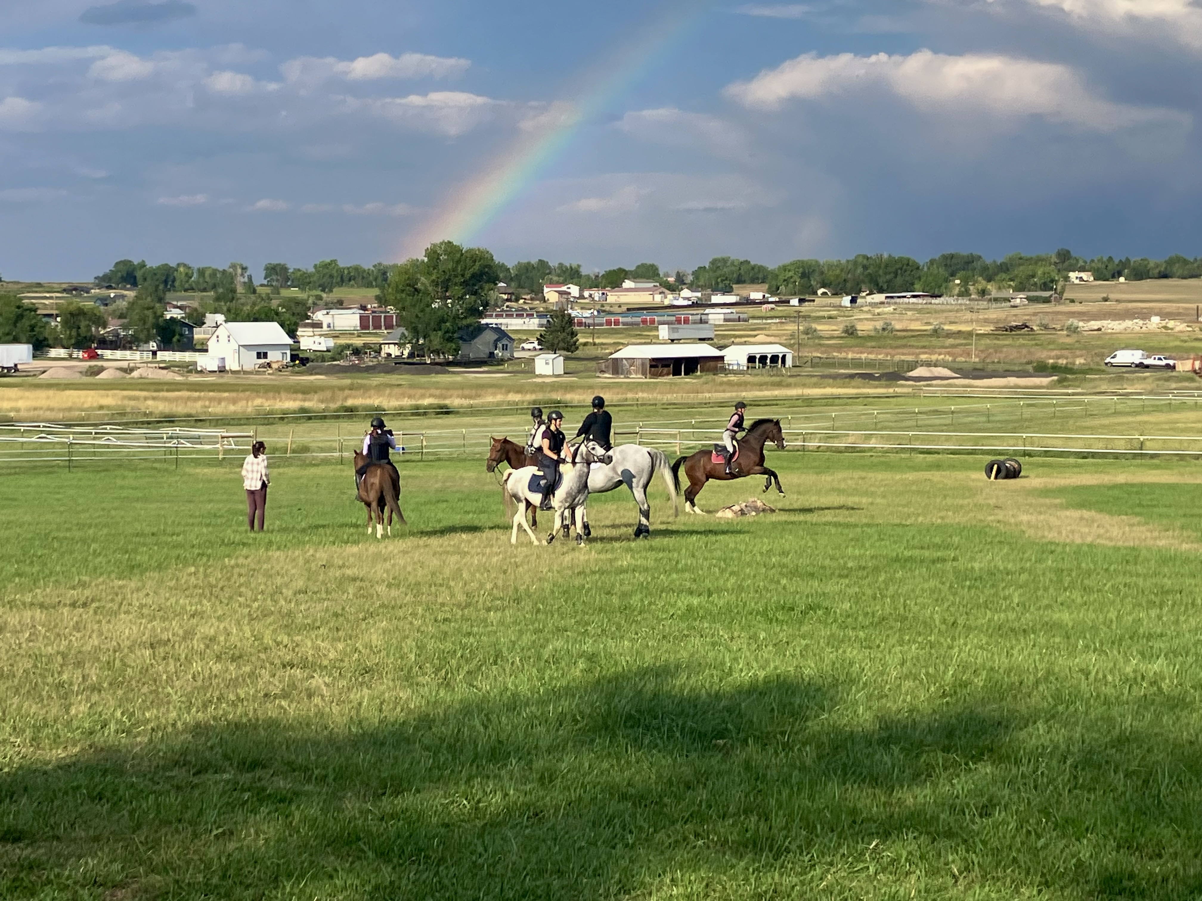 Campers learning horsemanship at All Strides Equestrian Center